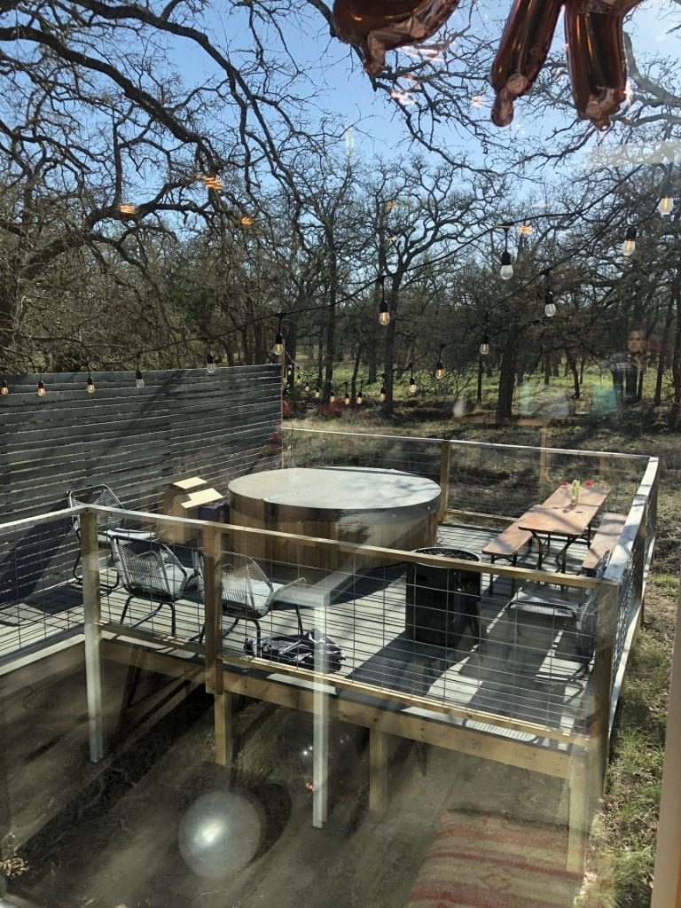 View of hot tub and patio area